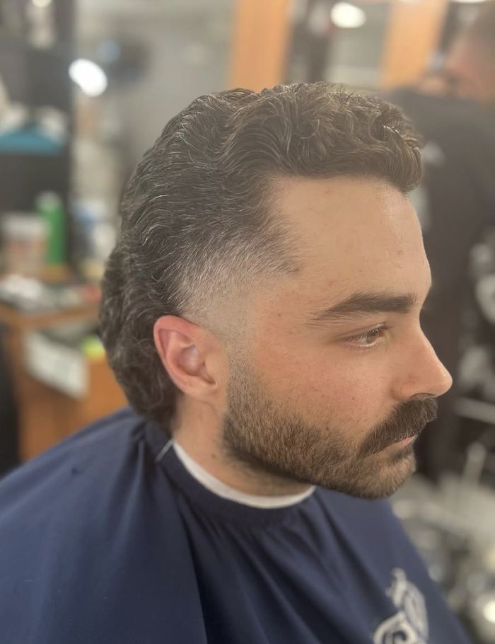Textured pompadour haircut